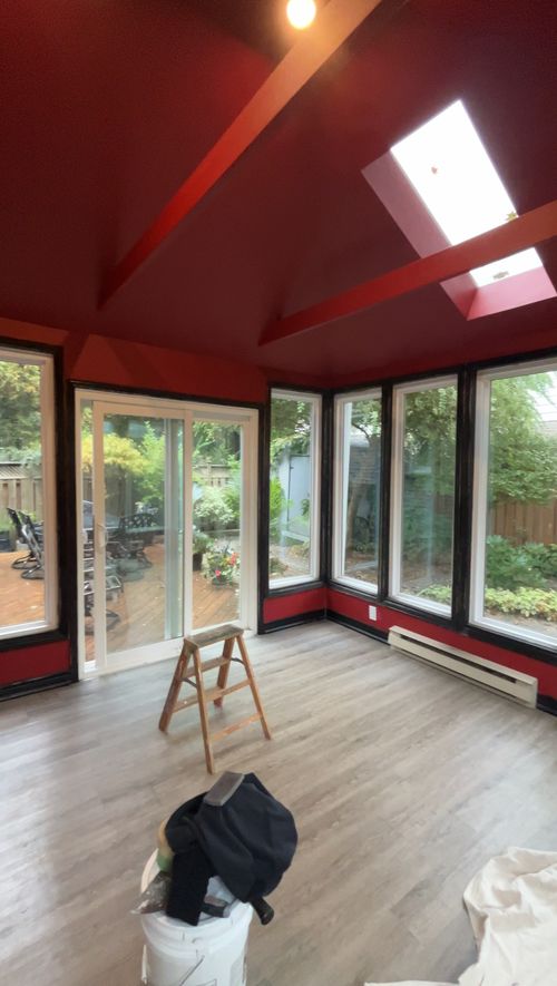 Sunroom before: red walls and ceiling